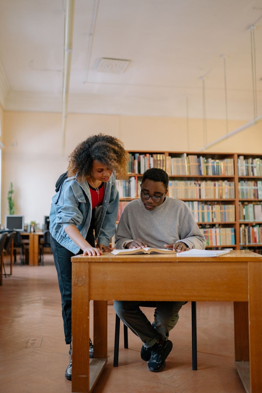 Student reading in a library